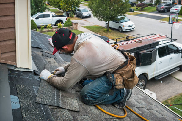 Professional Roofing technician working in Belmont, MI